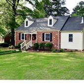 Brick Cape Cod House in a Suburban Neighborhood