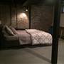Modern Loft Studio with exposed brick walls