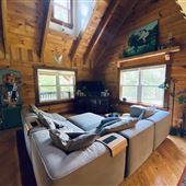 Log Cabin with Horses near the James River